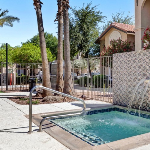 Settle into comfort at The Highlands at Spectrum pool spa with fountain