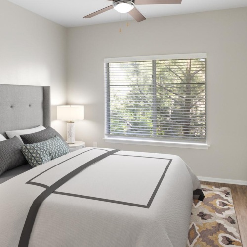 Beautiful bedrooms to fit every need a bedroom with a bed and a fan